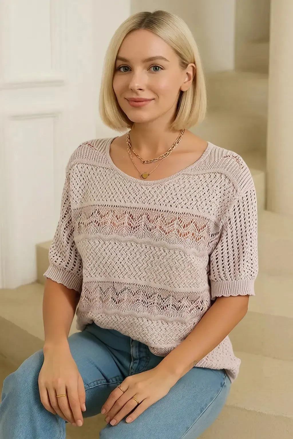 Haut tricoté à manches courtes et ajouré