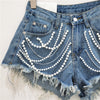 Short en jean avec bordure en strass
