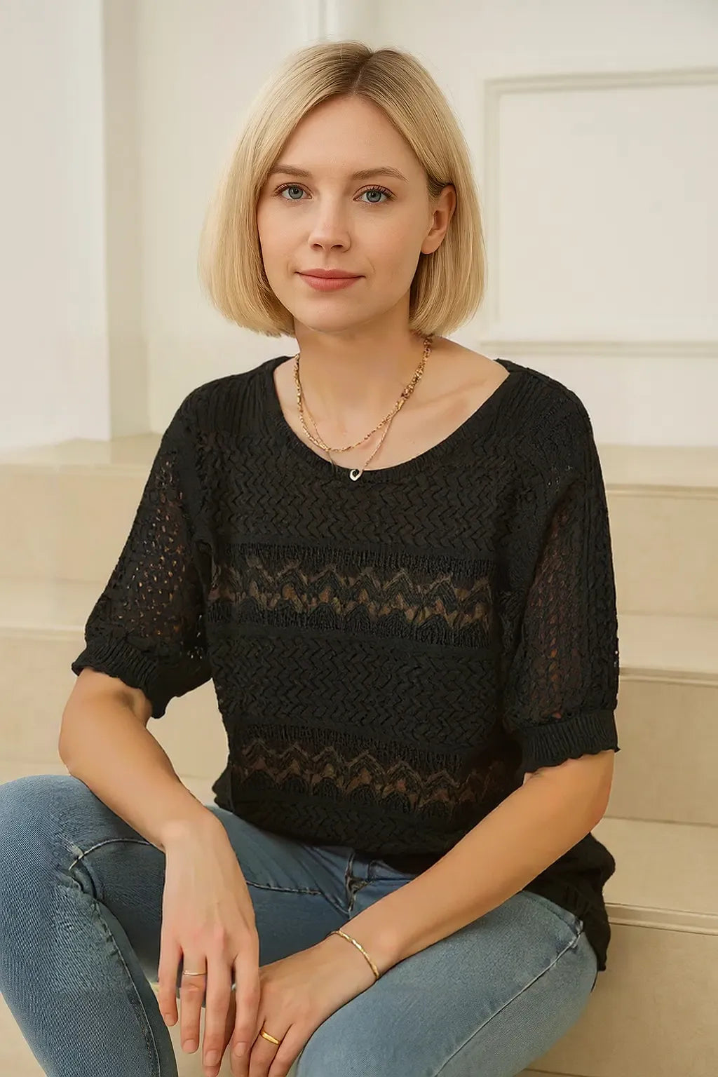 Haut tricoté à manches courtes et ajouré