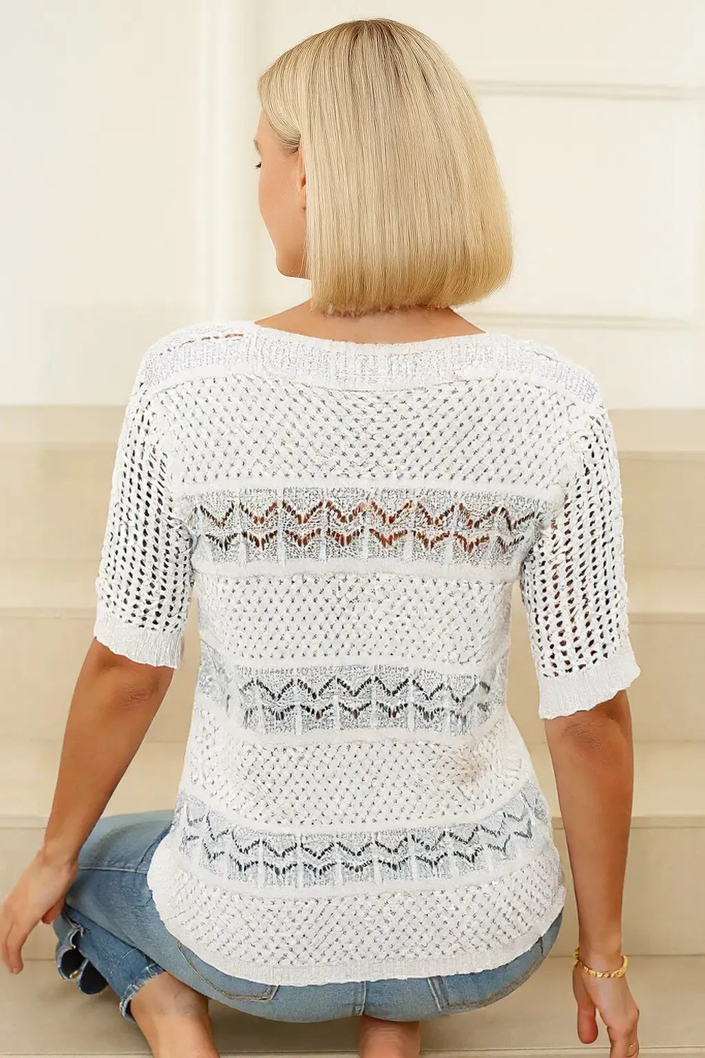 Haut tricoté à manches courtes et ajouré