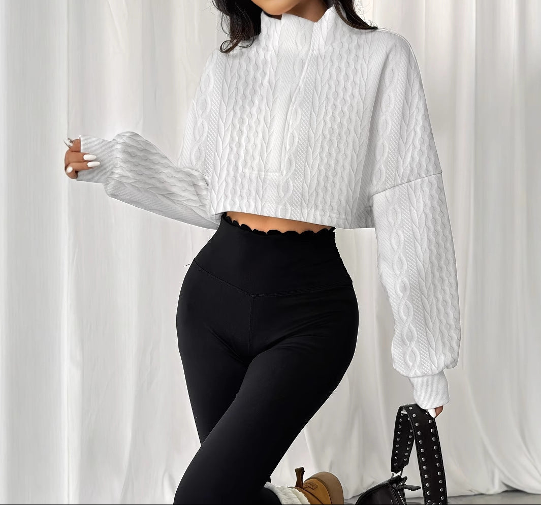 Haut élégant à col montant texturé