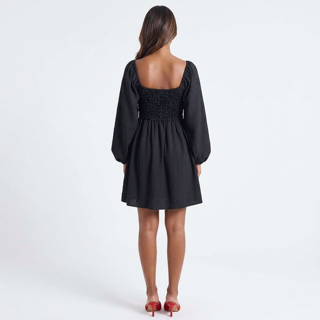 Whispered Promises Smocked Mini Dress – Black